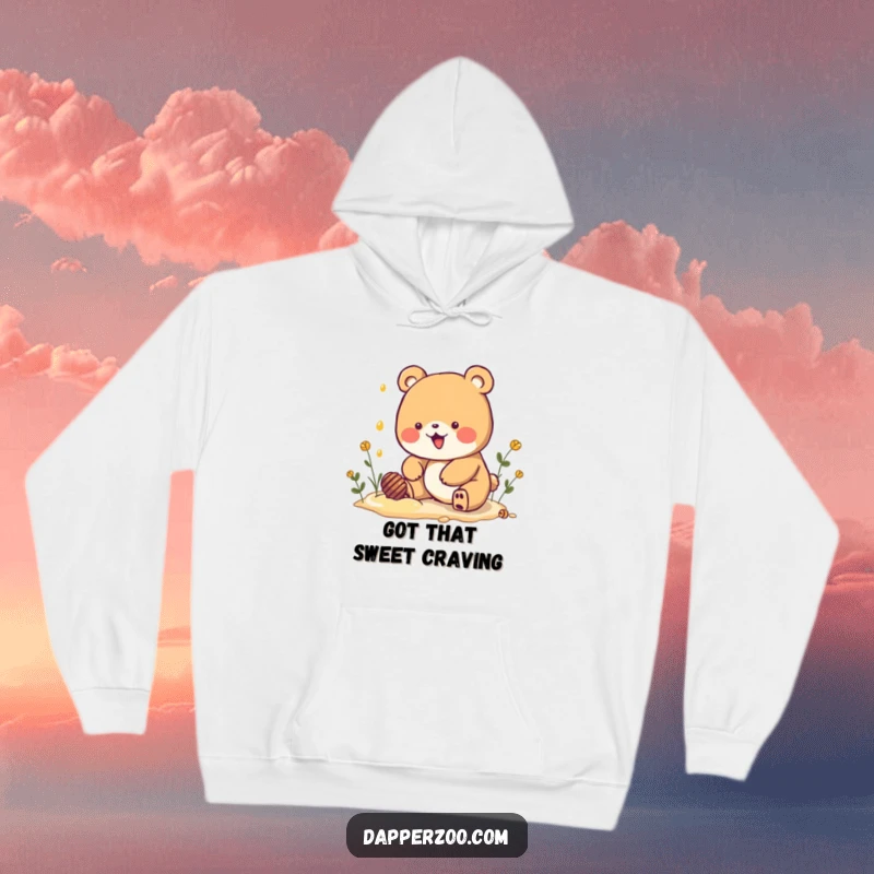 Funny Kawaii bear character digging intensely for imagined honey on a comfortable hoodie, exuding warmth and humorous determination.