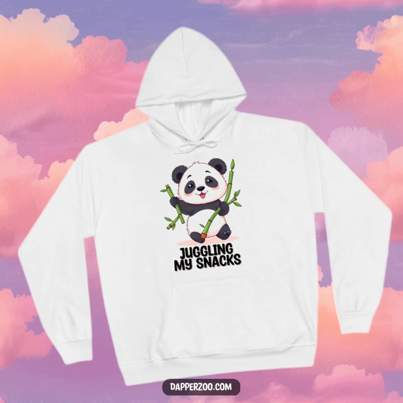 Funny panda hoodie featuring a fluffy panda character attempting to juggle bamboo stalks with a look of clumsy, endearing delight.