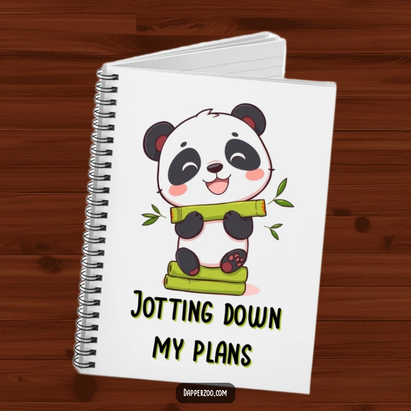 Funny panda notebook featuring a grinning bear character attempting to balance bamboo shoots.