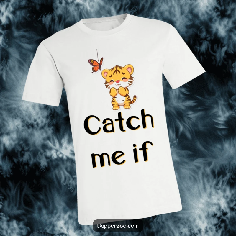 Funny t-shirt depicting a playful tiger cub enthusiastically batting at a delicate dangling butterfly, full of youthful energy.
