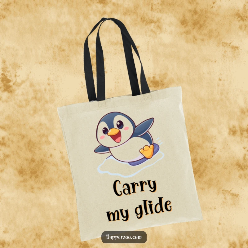 Funny penguin tote bag showing a cute penguin character excitedly sliding on its belly down an icy slope, eyes wide with delight.