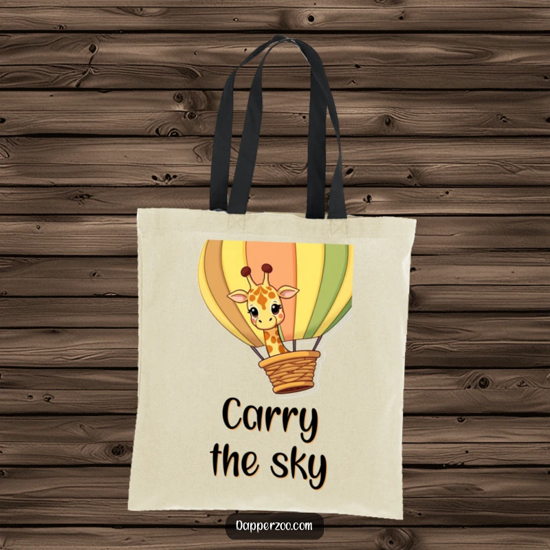 Funny giraffe tote bag showing a curious giraffe character peeking over a giant, colorful hot air balloon basket with wonder.
